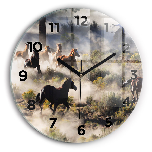 Horloge ronde Un troupeau de chevaux au galop