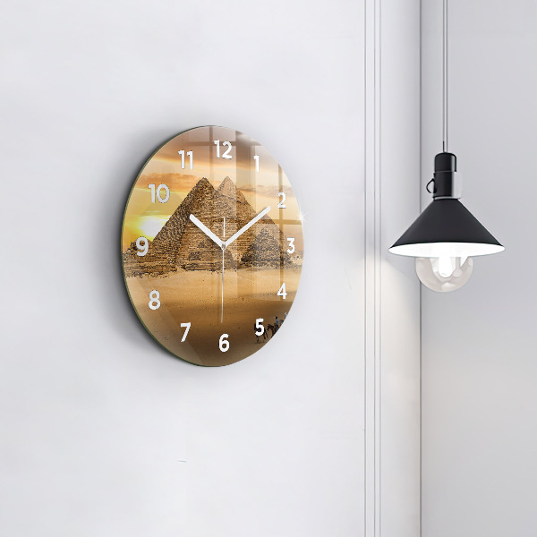 Horloge ronde Pyramides et coucher de soleil