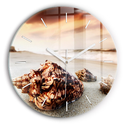 Horloge ronde Un coquillage sur la plage