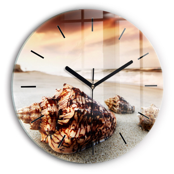 Horloge ronde Un coquillage sur la plage