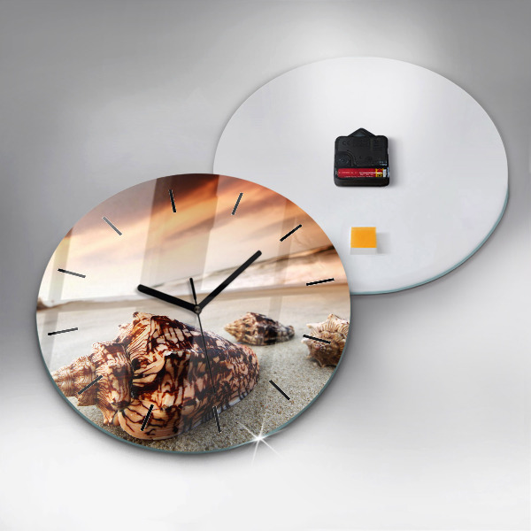 Horloge ronde Un coquillage sur la plage