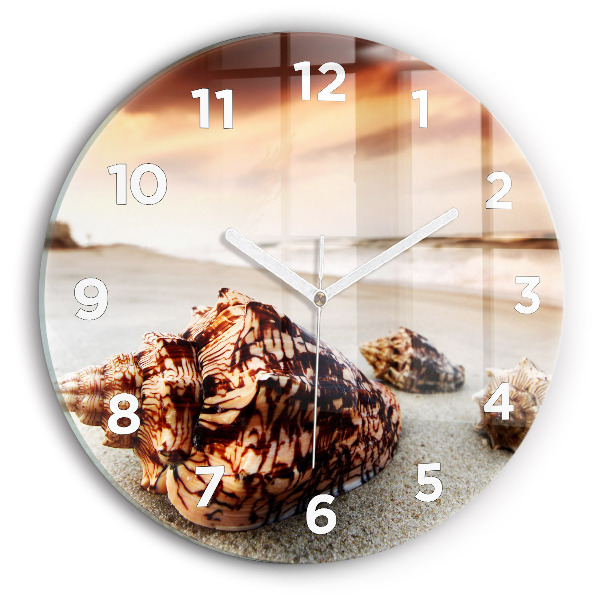 Horloge ronde Un coquillage sur la plage