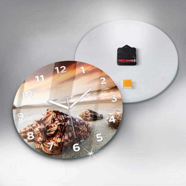 Horloge ronde Un coquillage sur la plage