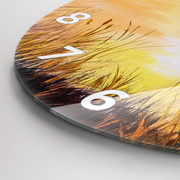 Pendule murale ronde Grues au coucher du soleil