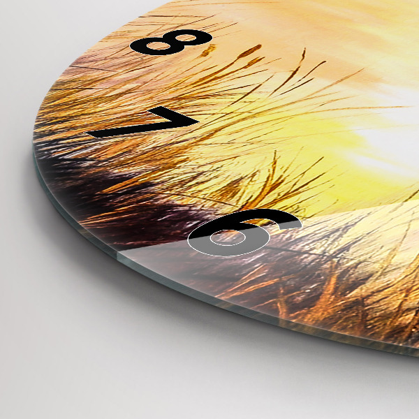 Pendule murale ronde Grues au coucher du soleil