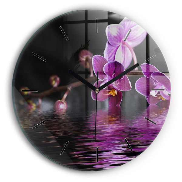 Horloge ronde 'Fleur d''orchidée sur l''eau'