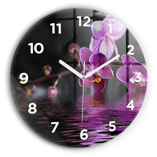 Horloge ronde 'Fleur d''orchidée sur l''eau'