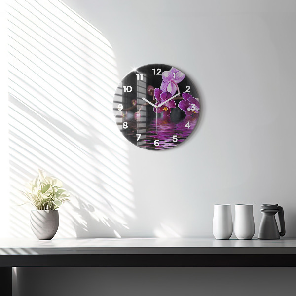 Horloge ronde 'Fleur d''orchidée sur l''eau'