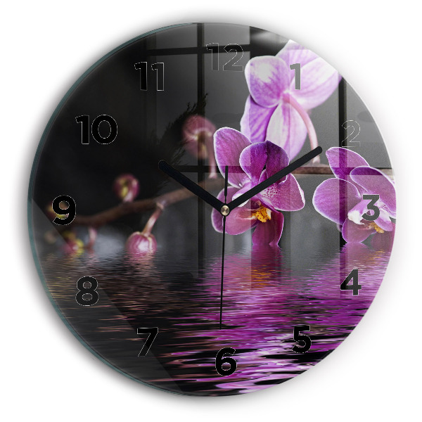 Horloge ronde 'Fleur d''orchidée sur l''eau'