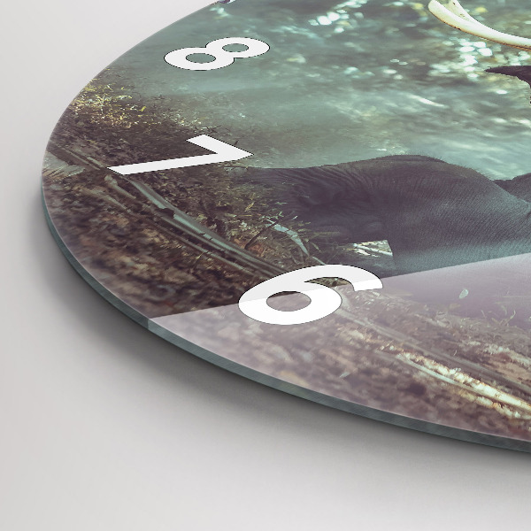 Horloge ronde Un garçon lit un livre