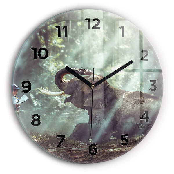 Horloge ronde Un garçon lit un livre