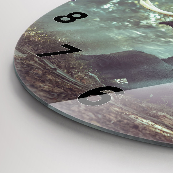 Horloge ronde Un garçon lit un livre