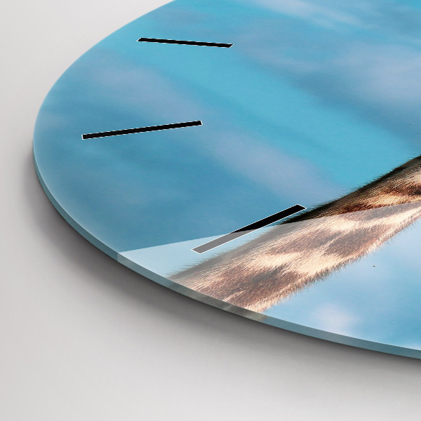 Horloge ronde Tête de girafe contre le ciel