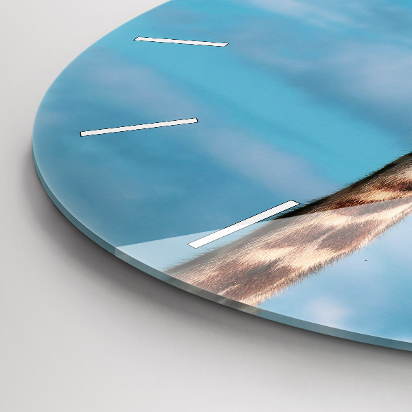 Horloge ronde Tête de girafe contre le ciel