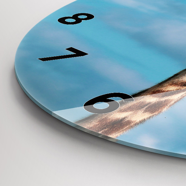 Horloge ronde Tête de girafe contre le ciel