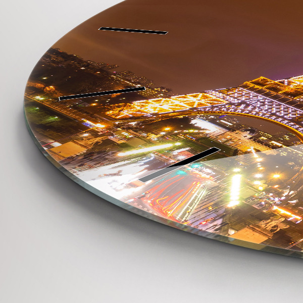 Horloge ronde Tour Eiffel illuminée