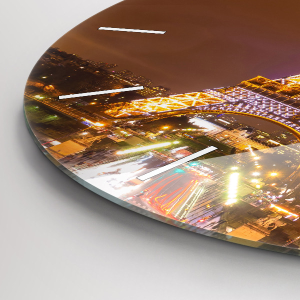 Horloge ronde Tour Eiffel illuminée