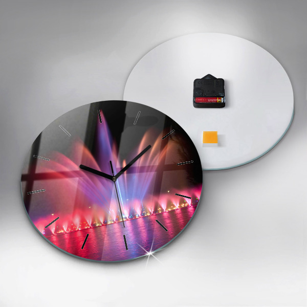 Horloge ronde Fontaine de Wroclaw la nuit