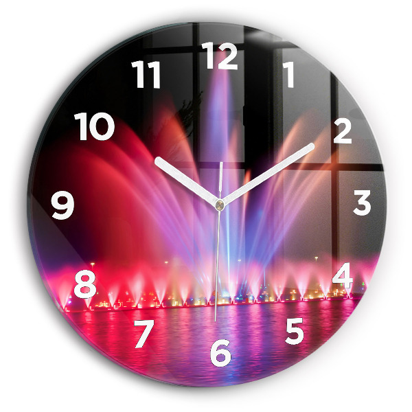 Horloge ronde Fontaine de Wroclaw la nuit