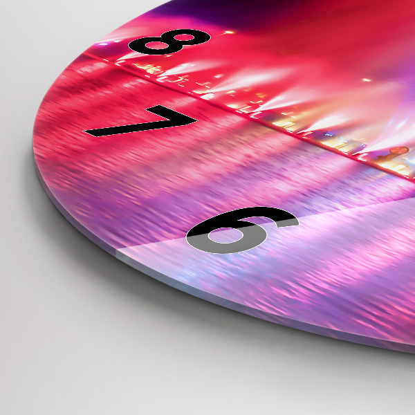 Horloge ronde Fontaine de Wroclaw la nuit