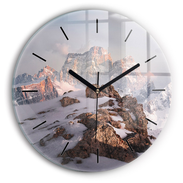 Horloge ronde Une montagne couverte de neige