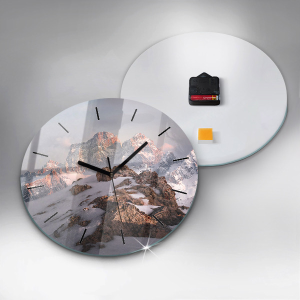 Horloge ronde Une montagne couverte de neige