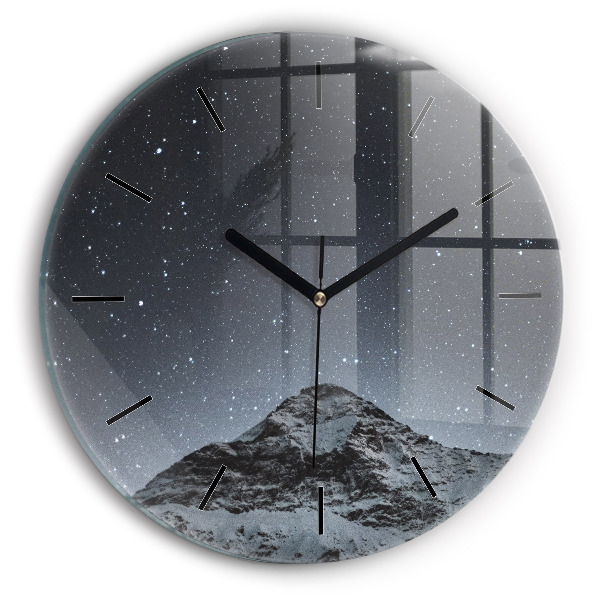 Horloge ronde Montagne sous les étoiles
