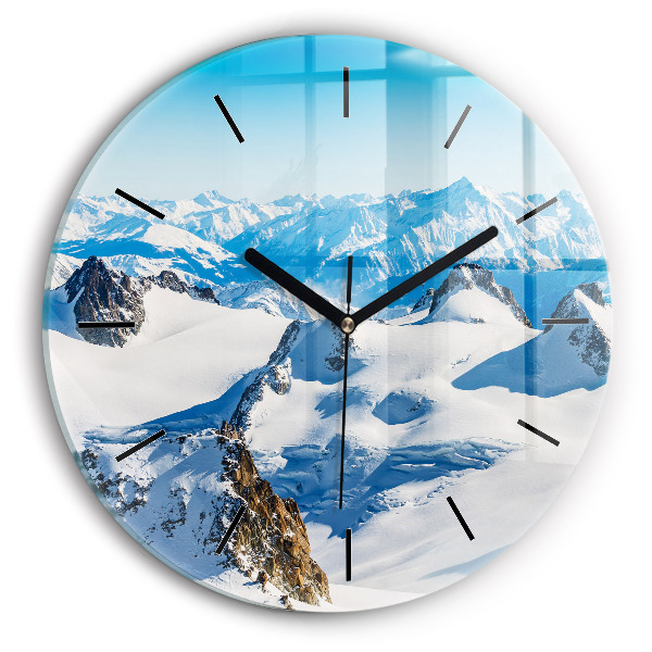 Horloge ronde Skieur dans les Alpes