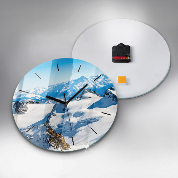 Horloge ronde Skieur dans les Alpes