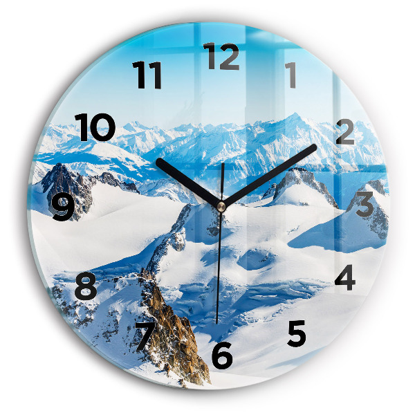 Horloge ronde Skieur dans les Alpes