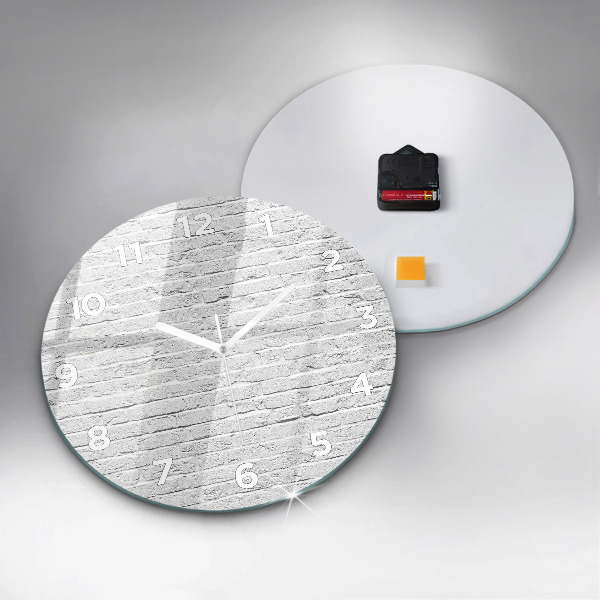 Horloge ronde Un mur de briques claires
