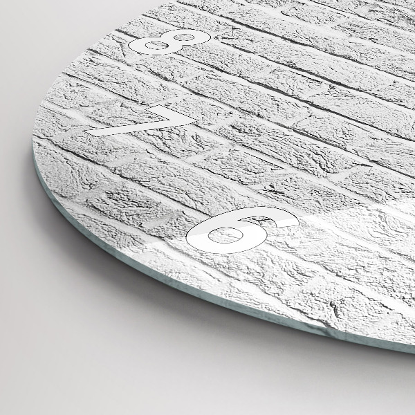 Horloge ronde Un mur de briques claires