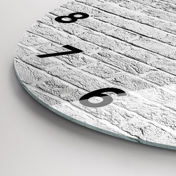 Horloge ronde Un mur de briques claires