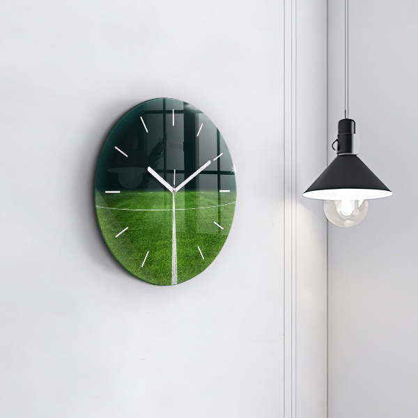Horloge ronde terrain de football