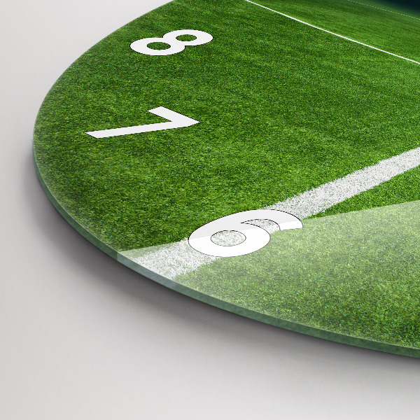 Horloge ronde terrain de football