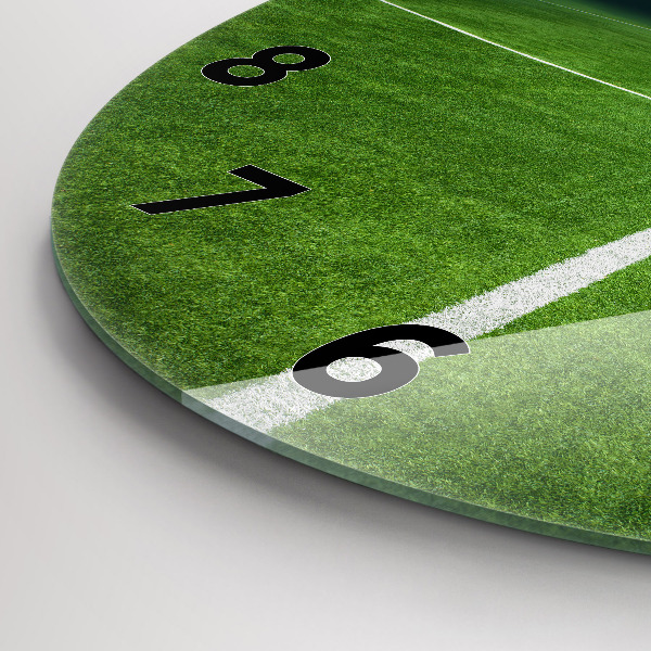 Horloge ronde terrain de football