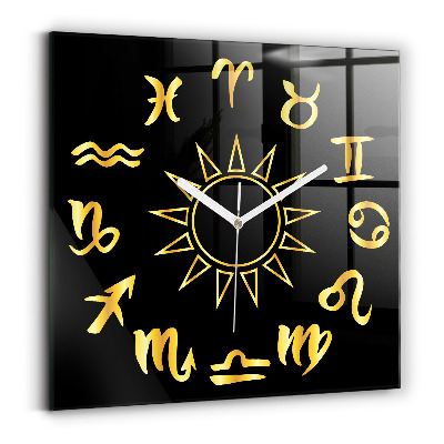 Horloge murale carrée élégant Signes astrologiques dorés sur fond noir.